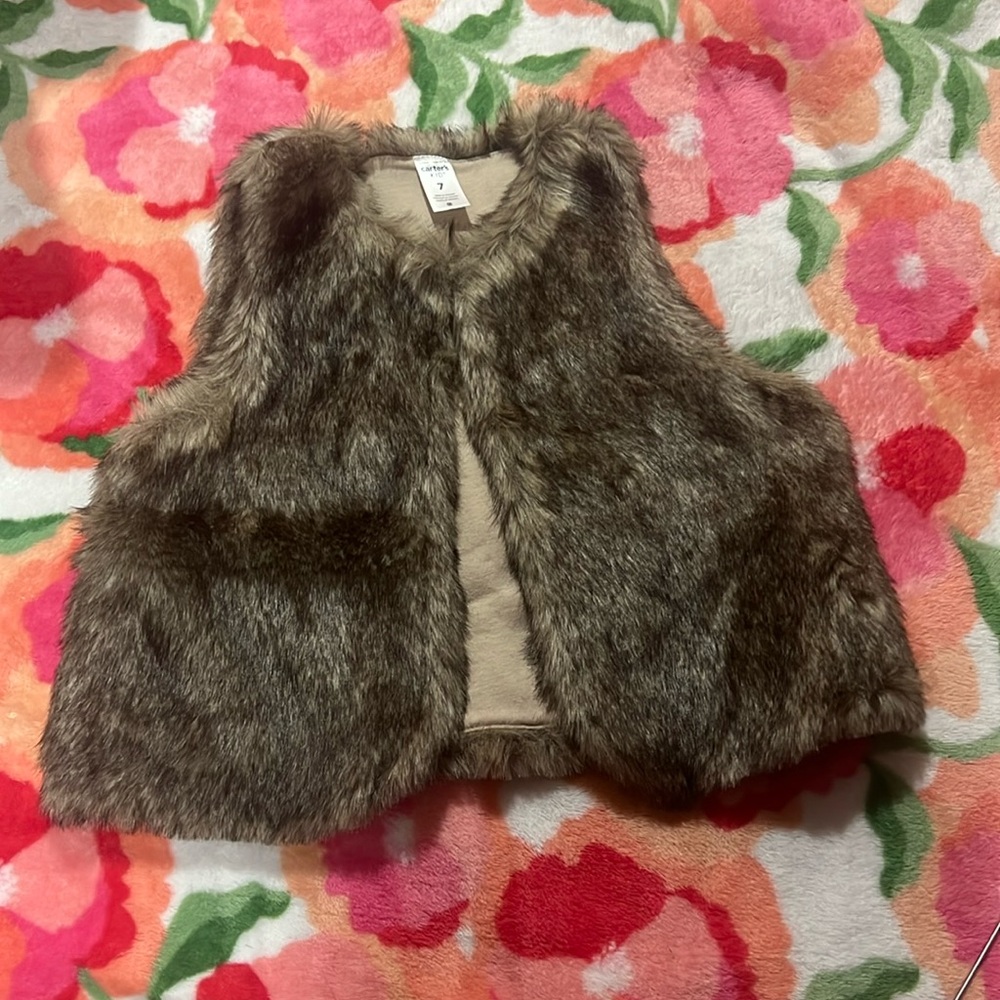 Carter’s kid size 7 faux fur vest